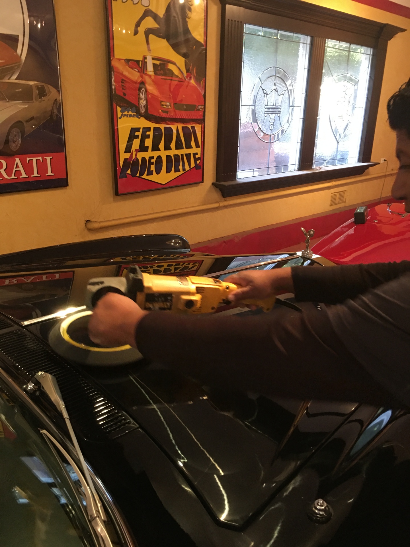 Professional paint correction polishing on classic car