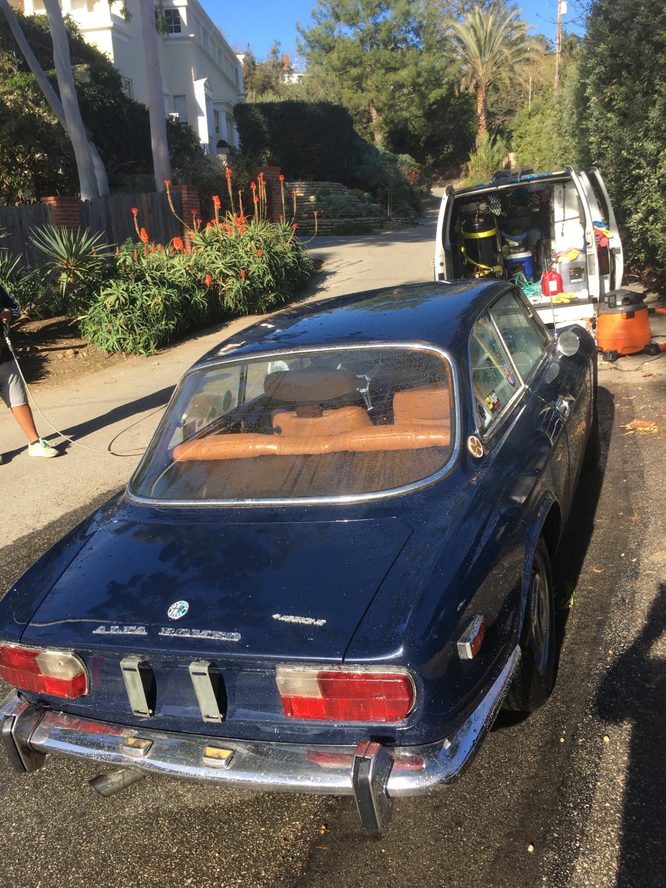 Classic Alfa Romeo GTV being detailed on location
