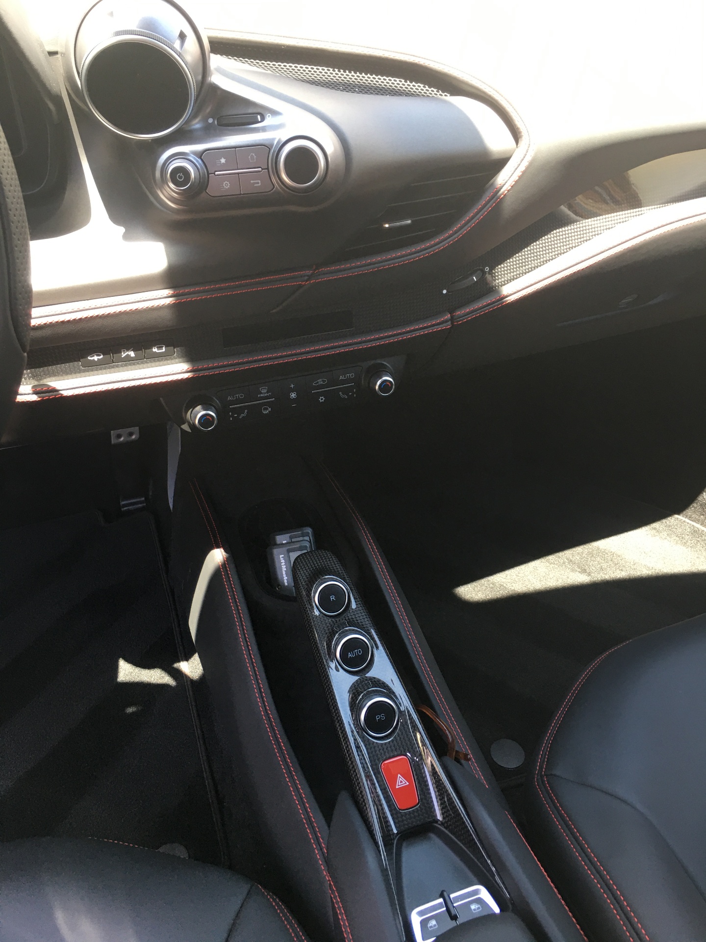 Ferrari interior carbon fiber console detail